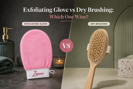 Zomno exfoliating glove next to a dry brush on a light concrete surface, both on a folded towel
